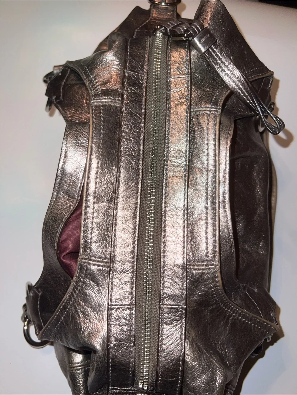 Coach Madison Maggie hobo shoulder bag featuring a metallic gunmetal leather